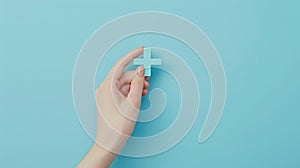 Hand Holding Blue Plus Symbol.AI generated image