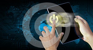 Hand press power button on a digital tablet screen