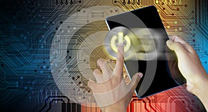 Hand press power button on a digital tablet screen