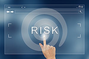 Hand press on risk button on website