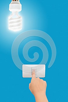 Hand pressed to switch to turn off the light