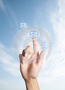 Hand presses the button (icon of letter)