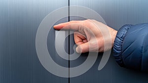 A hand pressing an elevator button in a modern building interior, AI