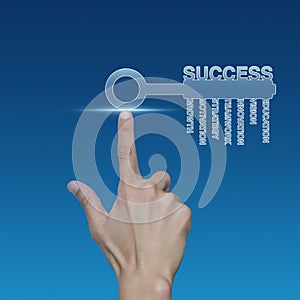 Hand pressing key with business words over blue background, Success business concept