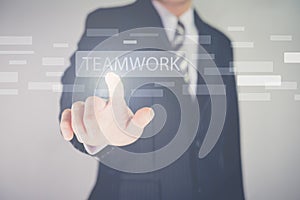 Hand pressing modern multimedia teamwork type buttons