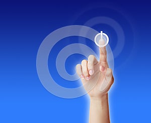 Hand pressing ON-OFF button