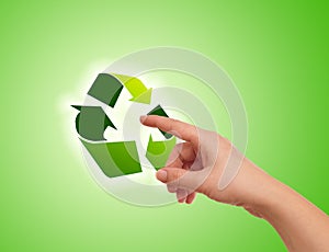 Hand pressing recycle icon