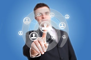 Hand pressing Social Network icon