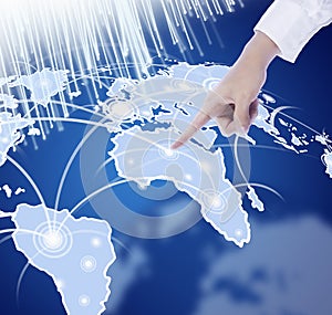 Hand pressing world map