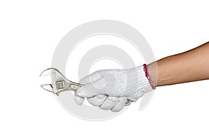 A hand with protection glove holding adjustable wrench spanner