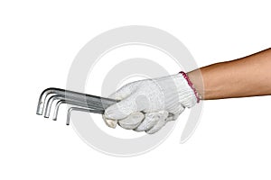 a hand with protection glove holding a various allen keys spanner