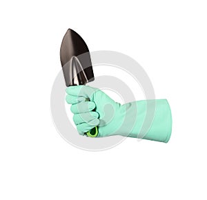 A hand in a protective glove holds a garden shovel. Isolated on white with saved path.