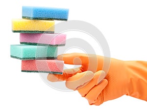 Hand in protective glove with washing sponge