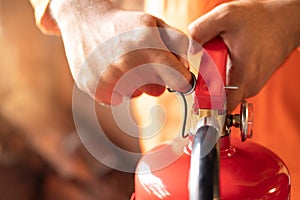 Hand Pull latch presses the trigger fire extinguisher