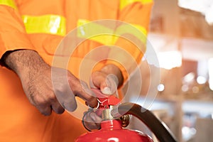 Hand Pull latch presses the trigger fire extinguisher