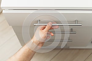 Hand pull open wooden drawer