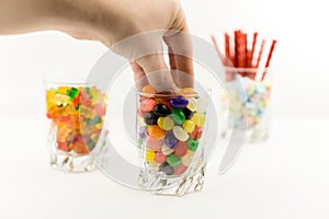 Hand Pulling Candy from Jar