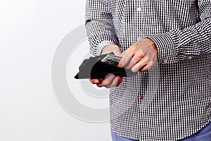 Hand pulling 100 dollars banknotes