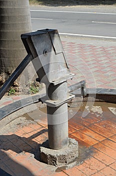 Hand pump, hand-operated water pump in a rural area of Himachal Pradesh, India. They can draw clean ground water.