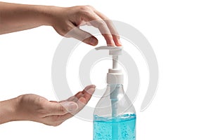 The hand pumping  the blue ethyl alcohol gel protection for coronavirus isolated on a white background with clipping path