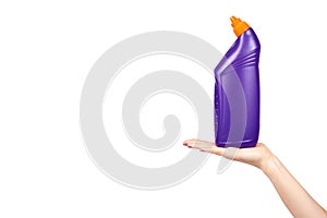 Hand with purple toilet gel, domestic hygiene, plastic bottle