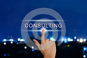 Hand pushing consulting button on touch screen