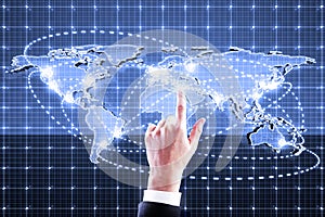 Hand pushing digital world map interface