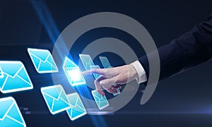 Hand pushing a envelope touchscreen button