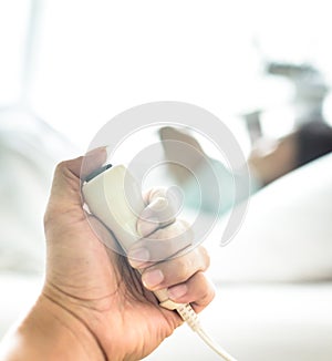 Hand pushing nurse call button