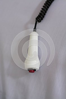 Hand pushing nurse call button