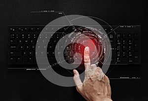 Hand pushing red button on computer keyboard, computer network and connection technology