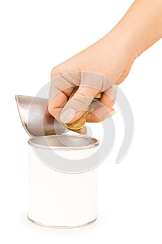 Hand put coin in tin with