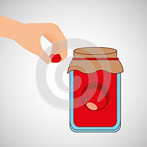 Hand puts cherry jar jam