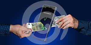 A hand puts euros into a smartphone and takes out dollars. Mobile banking, Online transfers, exchange, payment systems