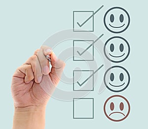 Hand putting check mark on customer.