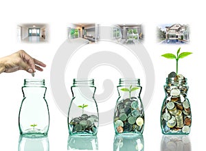 Hand putting mix coins and seed in clear bottle with step of construction house ,Business investment growth concept