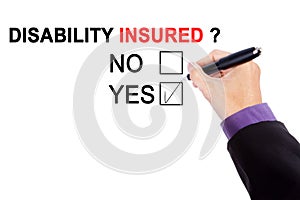 Hand with a question of disability insured