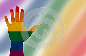 Hand rainbow fist for PRIDE month and the LGBTQIA+ movement. Pride Day for sexuality freedom, love diversity celebration, and the