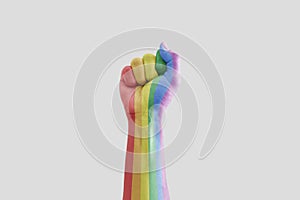 Hand raised. Rainbow pride colors, isolated on white background