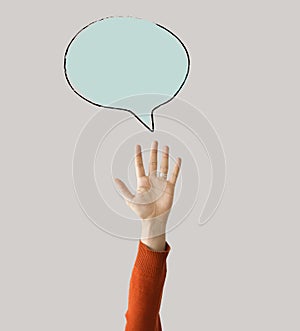 Hand raised with speech bubble
