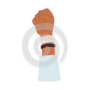 Hand raised up with clenched fist and bracelets for solidarity. Activist with arm rising high, resisting, protesting and