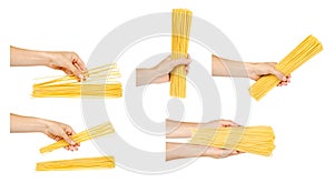 Hand with raw golden spaghetti, set and collection
