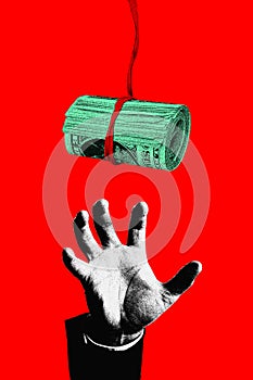 A hand reaching for dangling roll of money against red background. Contemporary art collage.