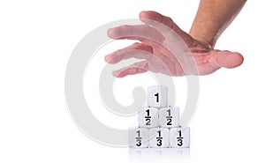 Hand reaching out for fraction dices