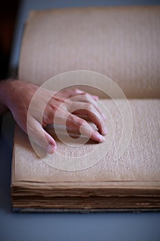 Hand reading braile
