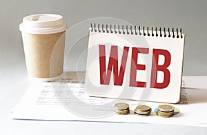 Hand with red pen. Cofee cup. Stick. Keyboard and white background. web sign in the notepad