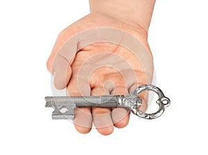 Hand with retro silver key