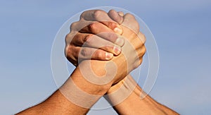 Hand, rivalry, vs, challenge, strength comparison. Two muscular hands. Rivalry concept. Two men arm wrestling. Arms