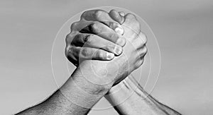 Hand, rivalry, vs, challenge, strength comparison. Two muscular hands. Rivalry concept. Two men arm wrestling. Arms