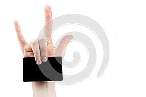 Hand with rock and roll sign holding blank for card, Bank card, isolated on white background, copy space